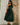Lizard Thicket model wearing the Carmen Green Embroidered Midi Dress