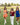 Image shows 5 models walking across football field, dressed in clothing from the Lizard Thicket Game Day Collection