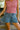 Evie Denim Tiered Flare Shorts- close up front view