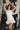 London White Ruffle Hem Romper- front view