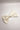 Image shows the Stacia Embellished Velvet Hair Bow in Ivory against a white background that features ivory velvet fabric with gold dot embellishments and a clasp closure.