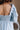 Gemma Light Blue Short Sleeve Romper - close up back of sleeve