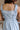 Bella Light Blue Ruffled Romper - close up back view