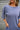 Charlie Dusty Indigo Short Sleeve Romper- close up front view