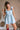 Breana Denim Ruffle Romper - front view