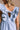 Breana Denim Ruffle Romper - close back view