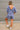 Charlie Dusty Indigo Short Sleeve Romper- full body back view