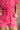 Victoria Pink Washed Denim Romper- close up frontal top view