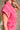 Victoria Pink Washed Denim Romper- close up side view