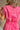 Victoria Pink Washed Denim Romper- close up back view