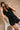 Nova Black Short Sleeve Belted Romper- top view