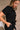 Nova Black Short Sleeve Belted Romper- close up side view