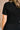 Nova Black Short Sleeve Belted Romper- close up back view