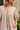 Sloane Taupe & White Stripe Short Sleeve Romper- close up front side view
