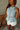 Payton Light Denim Split Hem Vest- close up side view