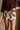 Freya Brown & Cream Cow Mini Skort- top view