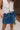 Jessie Denim Tie Waist Mini Skort- top front view