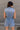 Viola Washed Denim Tie Waist Romper- close up back view