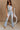 Evie Light Denim Halter Neckline Flare Jumpsuit- close up front view
