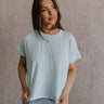Front view of female model wearing the Destiny Ribbed Short Sleeve Top in aqua blue which features Ribbed Fabric, Round Neckline and Short Sleeves.