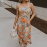 Full body view of female model wearing the Paislee Multi Floral Midi Dress which features Blue, Green, Orange, Pink, Red and Yellow Lightweight Fabric, Floral Pattern, Midi Length, Square Neckline and Adjustable Straps