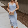 FUll body view of female model wearing the Colette Light Blue Midi Dress which features Light Blue Lightweight Fabric, Midi Length, V-Neckline and Tie Straps