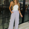 Full body view of female model wearing the Mila Lavender Cargo Pants which features Lavender Lightweight Fabric, Two Side Cargo Pockets, Two Front Pockets and Elastic Waistband.