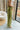 Side view of female model wearing the Rowan Olive Wide Leg Pants which features Olive Green Lightweight Fabric, Wide Pant Leg and Elastic V- Waistband