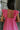 Close up back view of female model wearing the Alani Pink Ruffle Mini Dress which features Pink Lightweight Fabric, Mini Length, Ruffle Hem, Plunge Neckline and Ruffle Straps