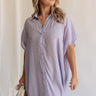Front view of female model wearing the Luna Lavender Button-Up Short Sleeve Mini Dress which features Lavender Lightweight Fabric, Button-Up Front Closure, Collared Neckline and Short Sleeves