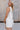 Madilyn White Back Bow Romper- side view