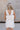 Madilyn White Back Bow Romper- back view