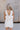 Madilyn White Back Bow Romper- back view