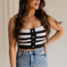 front view of female model wearing the Kai Black & White Stripe Knit Tank which features Black and White Crochet Knit, Stripe Pattern, Cropped Waist, Rhinestone Button Up, Square Neckline and Sleeveless