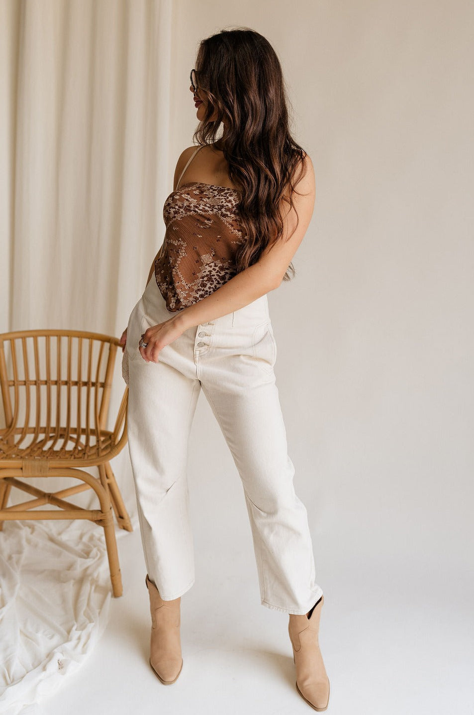 Full body view of female model wearing the Chana Ecru Bubble Wide Leg Pants which features Ecru Cotton Fabric, Bubble Wide Pant Legs, Front Button Up Closure, Two Front Pockets and Two Back Pockets