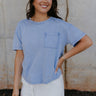 Front view of female model wearing the Ada Washed Cotton Short Sleeve Top which features Washed Cotton Fabric, Short Sleeves, Textured Thread Hem Details, Left Front Chest Pocket and Round Neckline