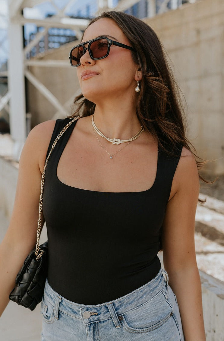 Model is shown from straight-on wearing the Jessica Knot Necklace.