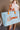 Summer Aqua & Orange Tote Bag - front view on model's arm