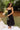 Genevieve Black Corset Midi Dress - full body front view - holding flowers