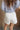 Phoebe White Pleated Shorts- back view