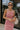 Upper body front view of female model wearing the Delilah Red & White Striped Midi DressDelilah Red & White Striped Midi Dress that has horizontal red and white stripes, a round neck, sleeveless, and midi hem.