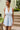 Rylee Light Blue & White Halter Neckline Romper- close up front view