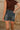 Lena Denim Studded Frayed Mini Skirt- close up back view