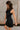 Daniela Navy Satin High Neckline Mini Dress- close up side view