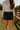 Corinne Dark Denim Mini Skort - close up front view