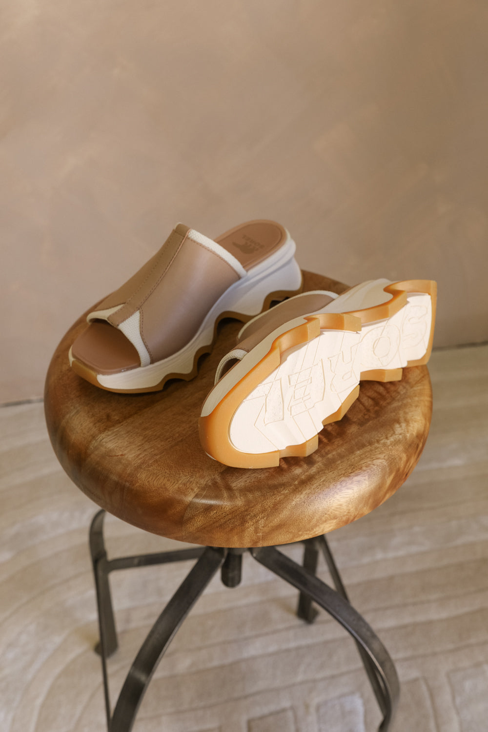Ariel view of the Kinetic Impact Slide High Wedge Sandal in Honest Beige & Honest White which features Sporty Slip-On Style, Beige and Cream Leather Upper, Two-Tone Scalloped Sole Detail, Molded Rubber Outsole, 2 1/4" Heel Height and 1 1/4" Platform Height