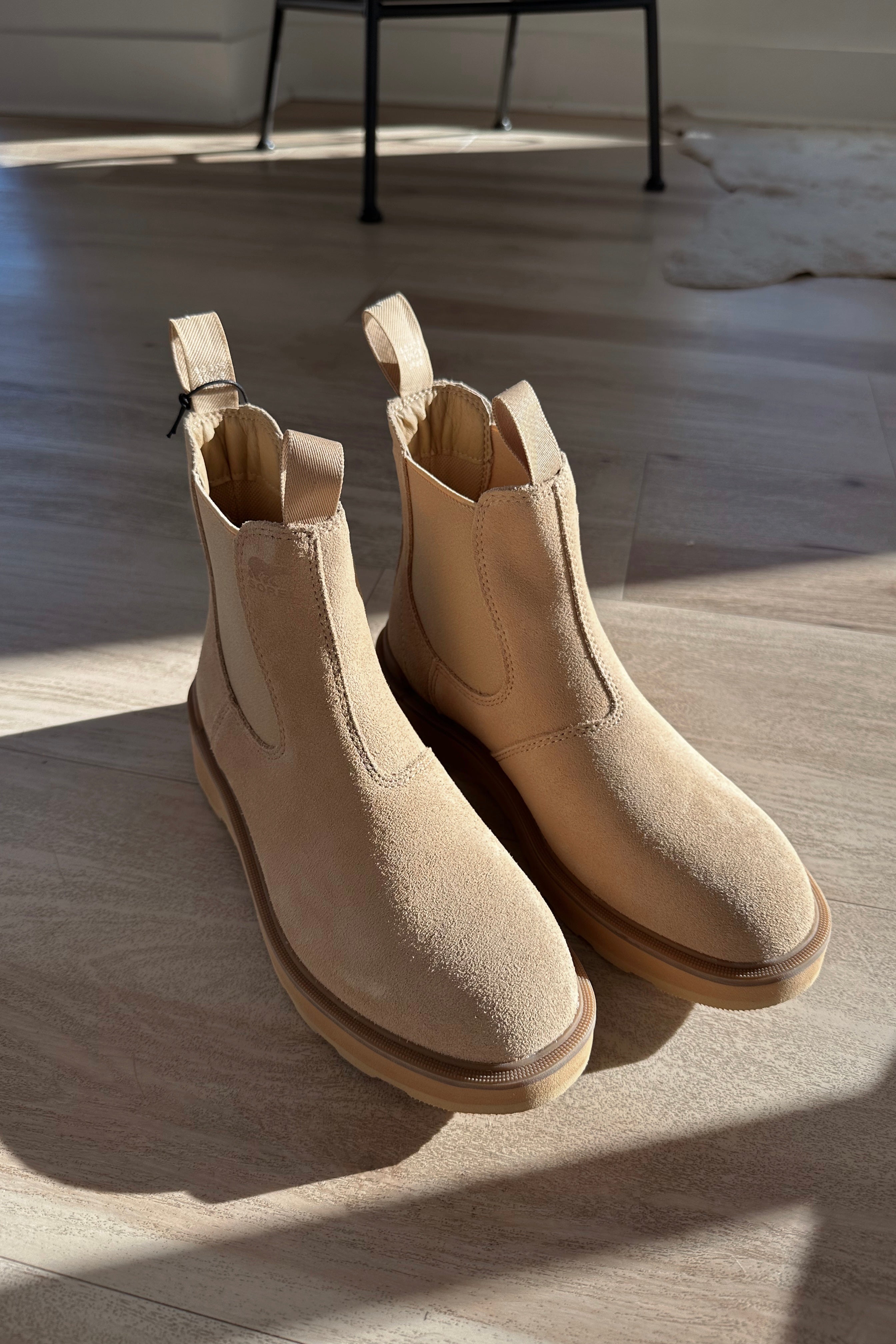 Front view of the Hi-Line Chelsea Boot in Canoe Ceramic which features tan waterproof suede, monochrome lightweight sole, stretch panels on each side, pull tabs, round toe, 1 inch platform height and 1 inch heel height