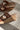Corkys Bad Habit Brown & Gold Stud Wedge Sandal- close up side heel view
