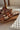 Corkys Bad Habit Brown & Gold Stud Wedge Sandal- close up side view