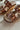 Corkys Bad Habit Brown & Gold Stud Wedge Sandal- close up top view